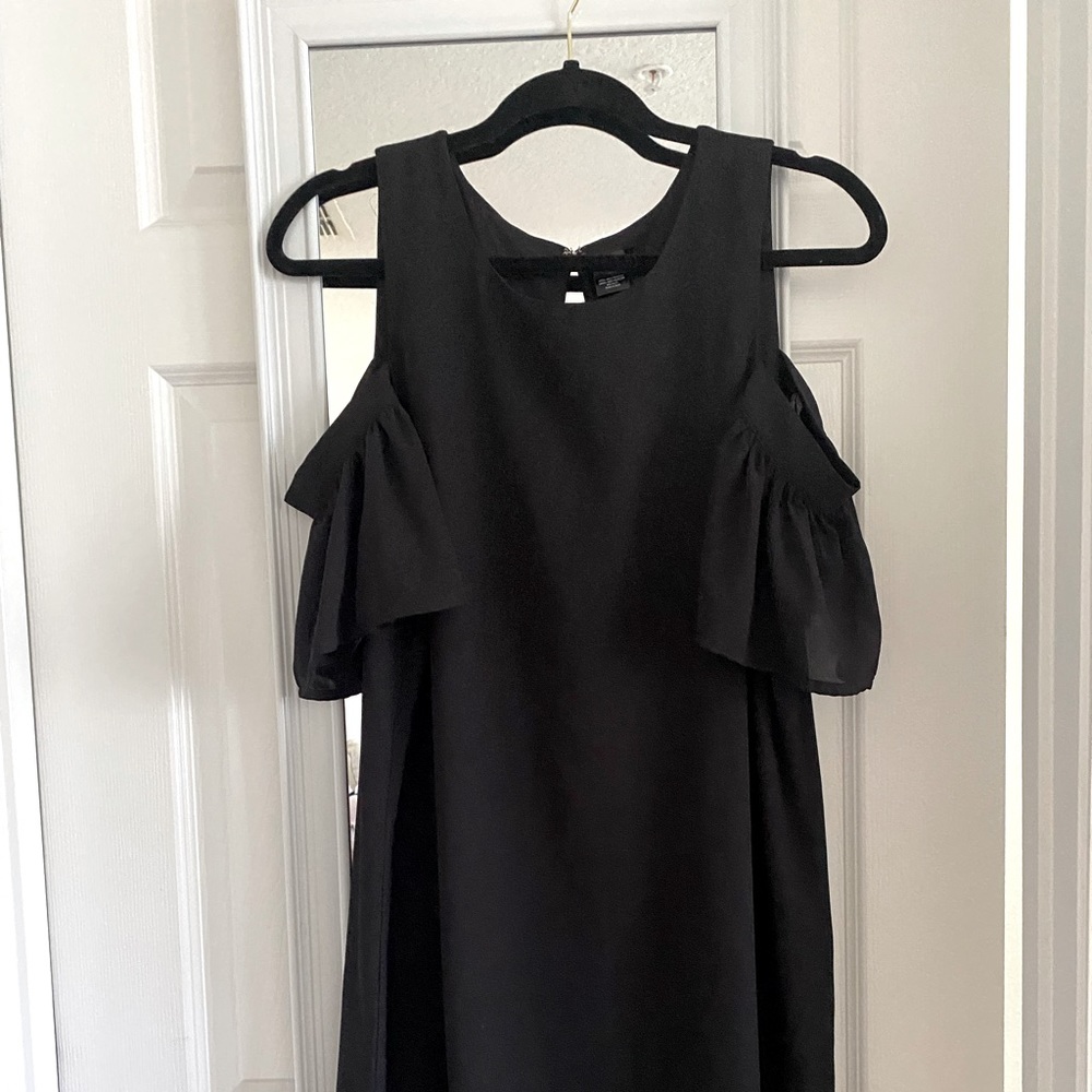 Black cocktail dress with open shoulder